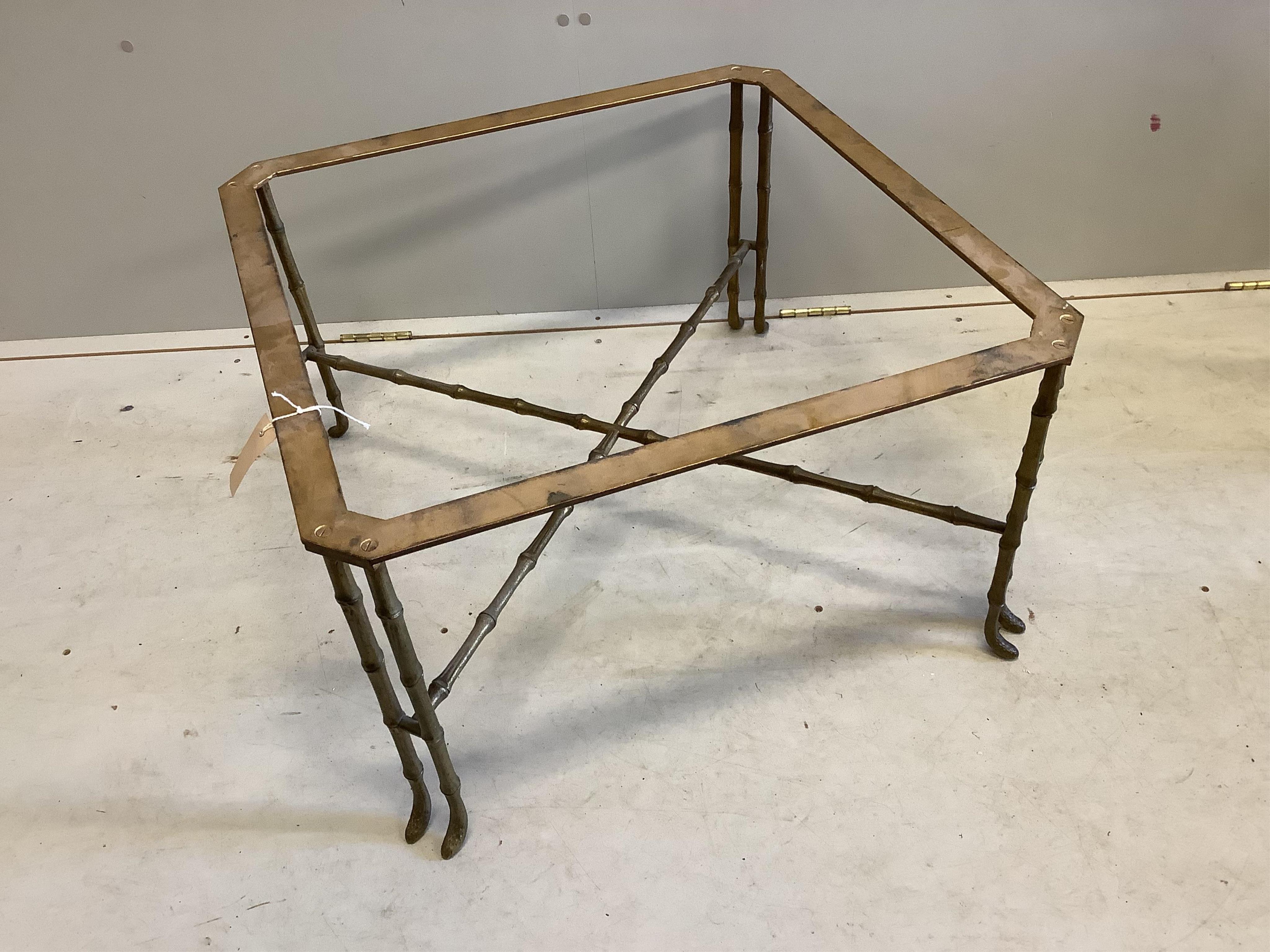 A Maison Jansen style brass and faux bamboo coffee table, lacks glass top, width 70cm, height 40cm. Condition - fair